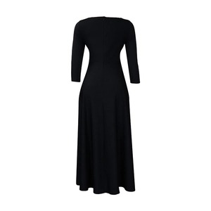 Rear view of black long-sleeved maxi dress with cinched waist and invisible zipper detail