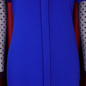 Detail shot of royal blue ribbed knit fabric with vertical placket and mesh splicing
