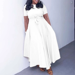 Detailed view of white short-sleeved maxi dress with waist tie and flared skirt