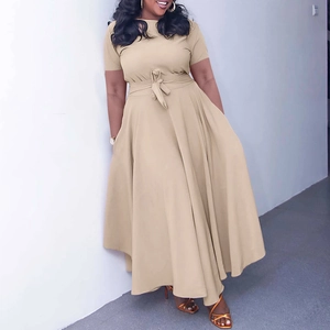 Detail of plus size khaki summer dress showing short sleeves and waist tie detail