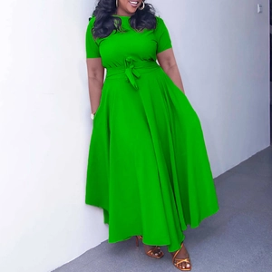 Detailed view of bright green plus size maxi dress with tie waist and flared hemline