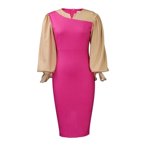 Detail of puff sleeves with tie-up cuffs on rose red and beige patchwork bodycon dress