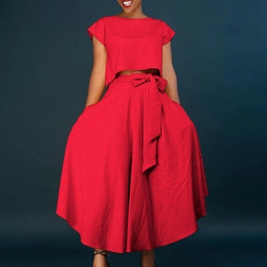 Women's chic two-piece red set featuring a short crop top and high-waist wide-leg pants