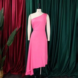 Detail of hot pink one-shoulder asymmetric dress with side ruching and pleated waist