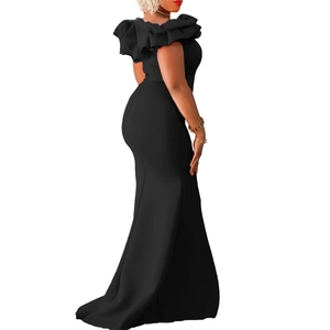 Detail view of black mermaid dress with tiered ruffle neckline and elegant slim fit design