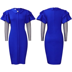 Detail of Klein blue bodycon dress featuring Peter Pan collar with a pearl button accent