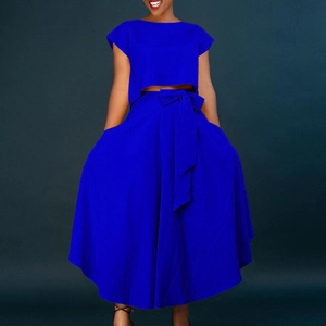 Women's royal blue two-piece set featuring short crop top and high-waisted maxi skirt