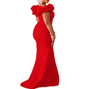 Detailed close-up of layered ruffle neckline and slim fit bodice on a red mermaid dress