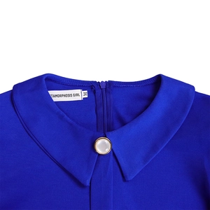 Detail of royal blue dress neckline with Peter Pan collar and elegant pearl button closure