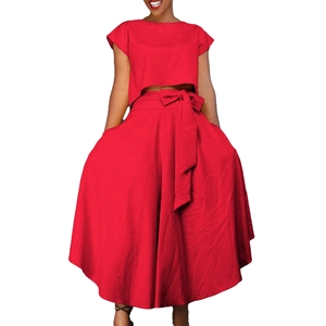 Detail of red crop top and wide-leg pants set with a stylish waist tie bow