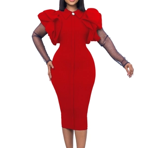 Detail of red slim fit dress with mesh polka dot sleeves and pleated ruffles