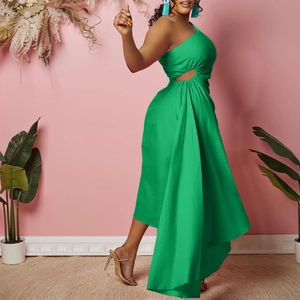 Detail of green one-shoulder dress with side waist cutout and irregular flowy skirt