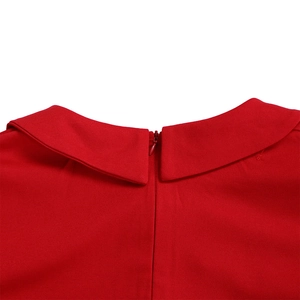 Detail view of red dress back with hidden zipper and Peter Pan collar stitching