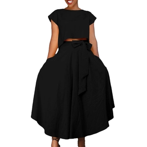 Detail of high-waist maxi skirt with bow belt and hidden side pockets in black