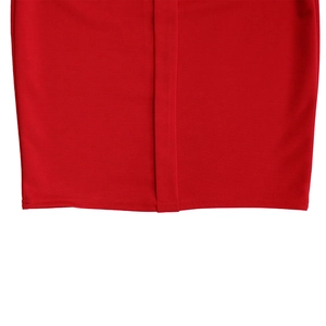 Close-up of red dress hem with detailed double-needle stitching and high-quality seam