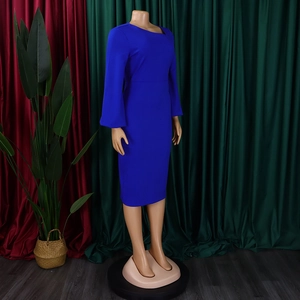 Detail view of royal blue long sleeve dress on mannequin against velvet backdrop