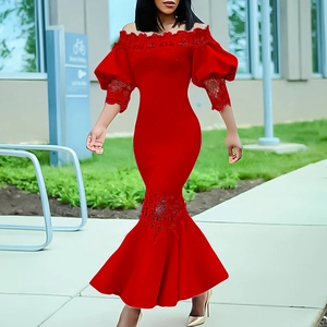 Detail of red off-shoulder mermaid dress featuring lace trim and puffy sleeves
