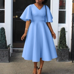 Elegant light blue V-neck dress with flare sleeves and A-line silhouette in a classic style