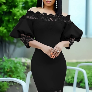Close-up of off-shoulder lace trim and puff sleeves on this elegant black fishtail dress
