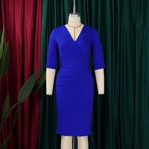 Detail view of royal blue V-neck bodycon dress with side ruching and mid-length sleeves