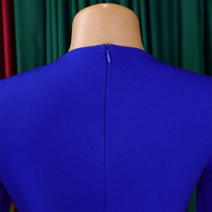 Detail of royal blue pencil dress showing high-quality invisible back zipper and textured fabric