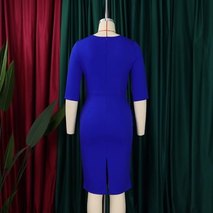 Detail of slim-fit blue dress with invisible back zipper and stylish hem slit