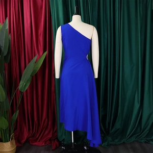 Detail of royal blue one shoulder dress featuring asymmetrical hem and pleated waist