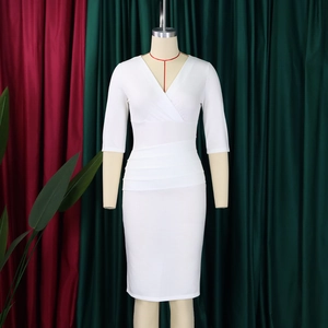 Detail of white V-neck dress featuring elegant waist pleats and slim-fit knitted fabric