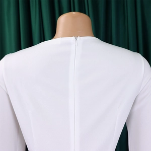 Detailed back view of white dress showing high-quality invisible zipper closure