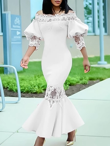 Elegant white off-shoulder mermaid dress with lace hollow-out details and puff sleeves