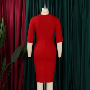 Detail view showing the red slim-fit midi dress with half sleeves and elegant back zipper