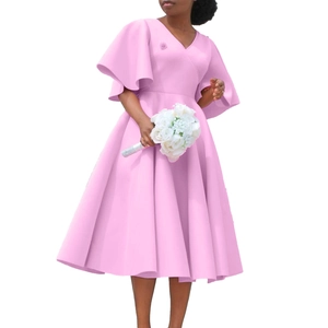 Detail of pink V-neck dress featuring elegant flared sleeves and cinched waistline