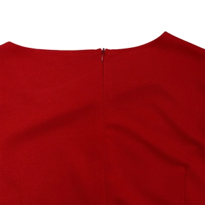 Detail view of red dress neckline featuring a seamless invisible zipper and fine stitching