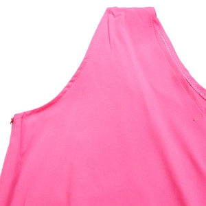 Detail view of bright pink dress featuring seamless stitching and an invisible zipper