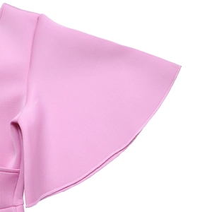 Detailed close-up of pink flare sleeve cuffs with high-quality stitching and fabric texture