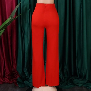 Detailed back view of high waisted red wide leg trousers with invisible zipper