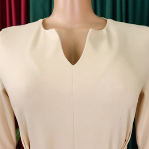 Detailed close-up of V-neck design on an elegant beige OL pencil dress for women