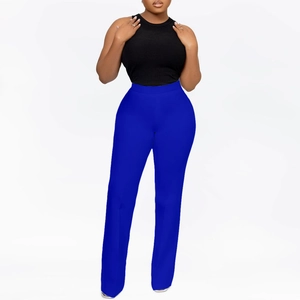 Detail of royal blue high-waisted wide-leg trousers with stretch elastic fabric texture