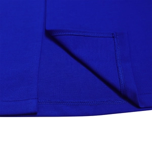 Close-up of royal blue dress fabric showing detailed double stitching and hem finish