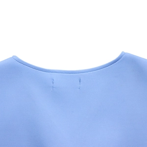 Detail of the light blue V-neckline featuring high-quality double-needle stitching