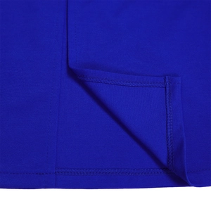 Macro detail of high-quality double-stitch hem on navy blue V-neck dress fabric