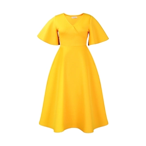 Detail of the elegant yellow V-neck dress featuring flared sleeves and a wide hemline