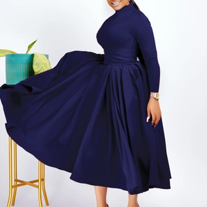 Detail of navy blue high neck long sleeve dress with voluminous pleated flared skirt