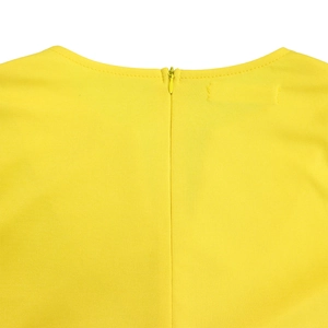Detail view of high-quality yellow pencil dress with invisible back zipper and round collar