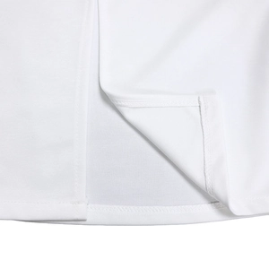 Detail of the high-quality stitching and slit hem on this white V-neck dress for women