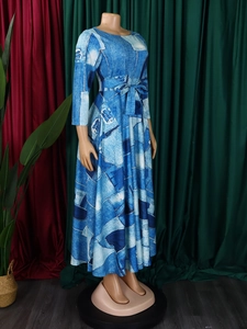 Detailed view of the blue floral print maxi dress featuring a waist-defining tied belt