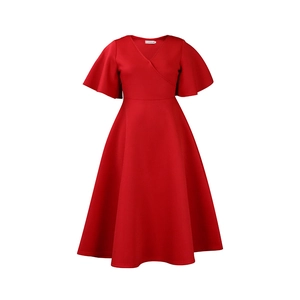 Detailed view of red V-neck dress featuring elegant ruffle sleeves and waist seam