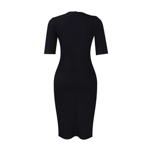 Detailed back view of a slim-fit black pencil dress with a discreet invisible zipper