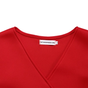 Detail view of red V-neck dress collar with brand size tag and high quality stitching