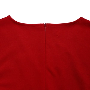 Detailed macro view of the V-neckline with invisible zipper on red woven dress